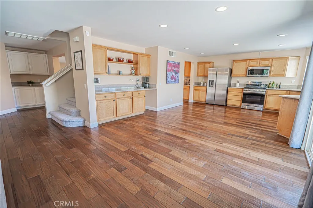 Kitchen with Ample Cabinets and Handy Counter for Tech