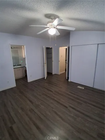 Primary bedroom, Bathroom, Walk in closet and sliding door closet.
