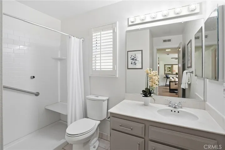 This full sized downstairs bathroom with walk-in shower and bench seating is an ideal combo to the downstairs bedroom.