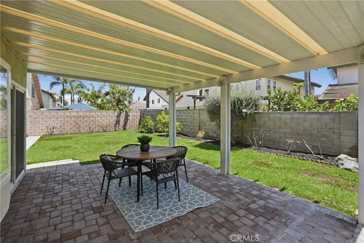 Enjoy this space outside under the patio cover.