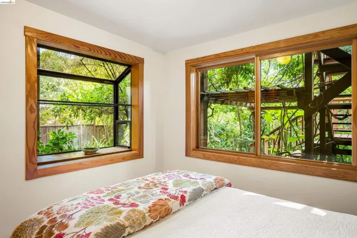 Dual windows featuring natural wood trim frames
