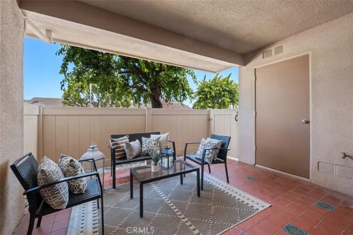 Enclosed Front Porch with Side Gate Access and Storage Closet