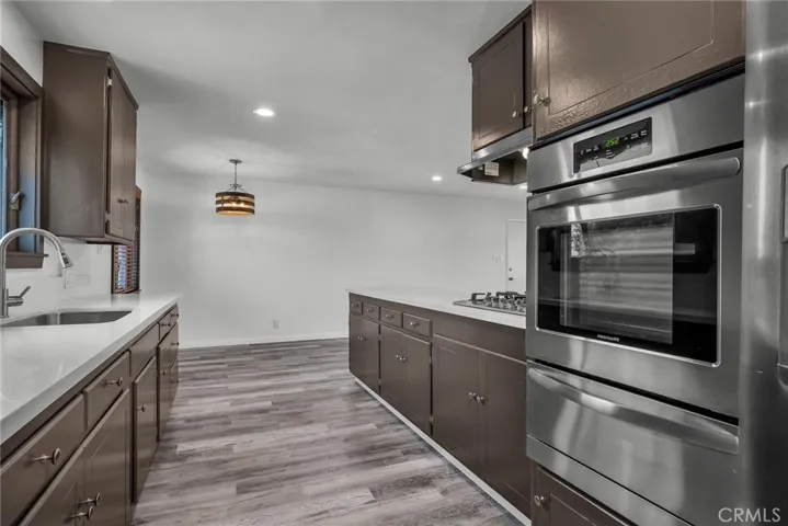 Galley Kitchen stainless appliances