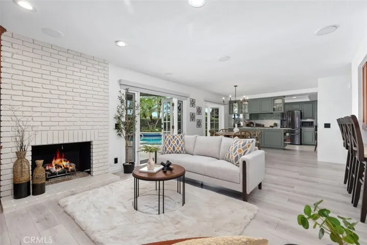 Family room with cozy fireplace.