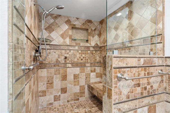 Large remodeled walk in shower in the primary bathroom.