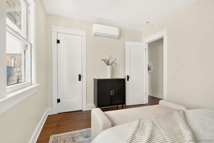 Large bedroom with lots of natural light and original charm.
