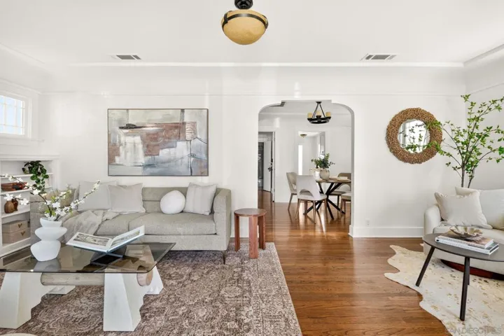 Large living space flooded with natural light.