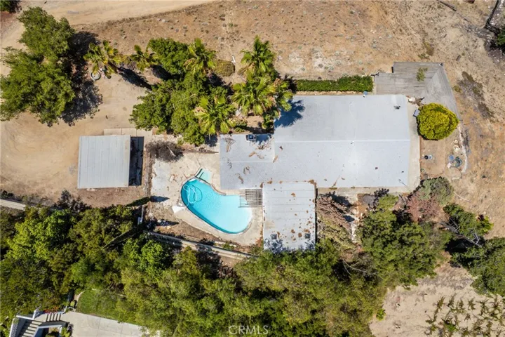 Above Aerial of House, Pool and Carport