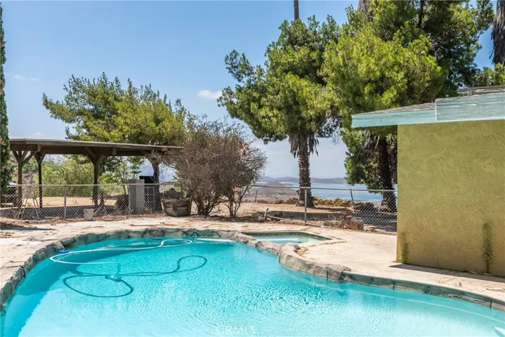 Pool, Spa, Carport and View of Lake