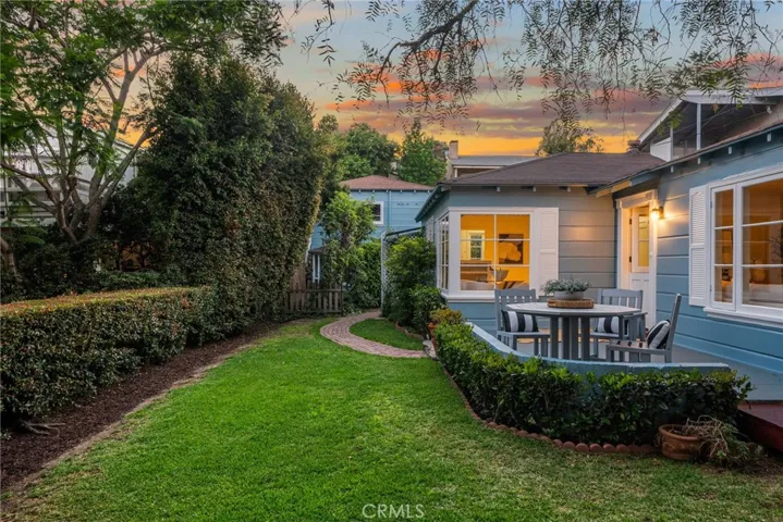 Twilight back of yard to front entrance