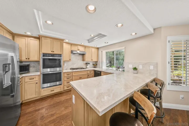 Kitchen also features a walk-in pantry
