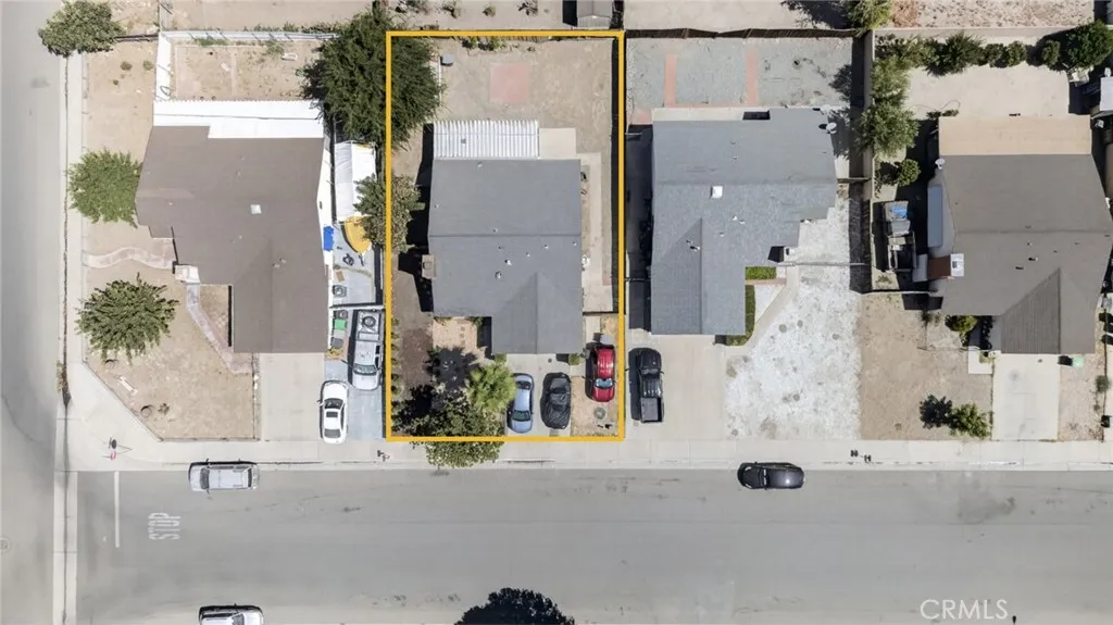 Aerial view with property boundaries outlined.