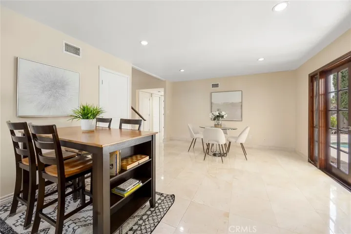 Kitchen opens to backyard