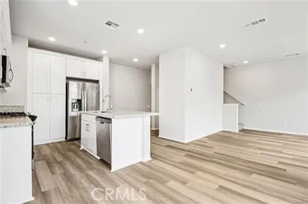 Vacant Pictures Kitchen w/ Gray Cabinets/Island