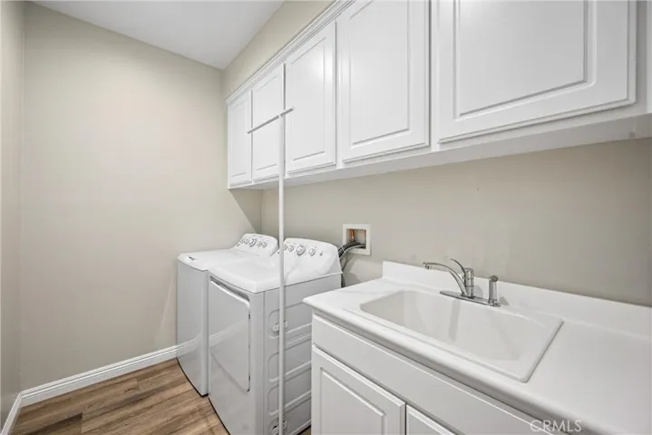 Fully equips laundry room near garage