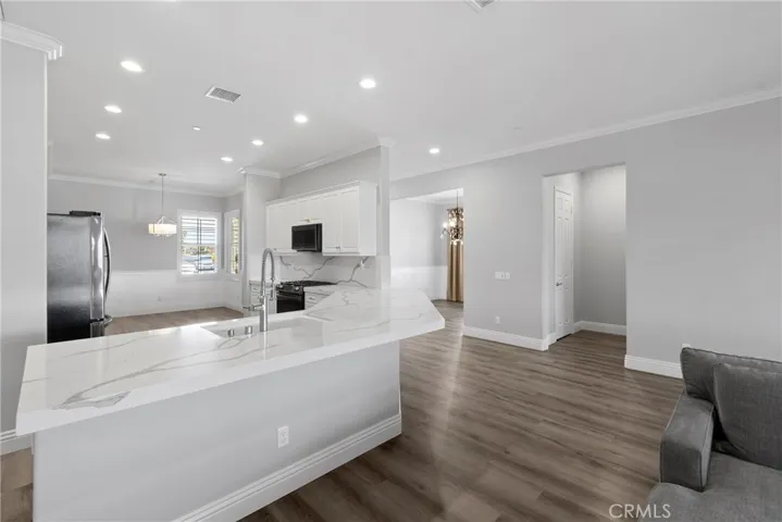 Custom Baseboards & Crown Molding - Wainscoting in Some Rooms