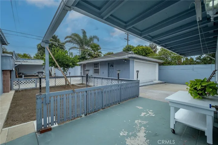Backyard and Detached 2 Car Garage View