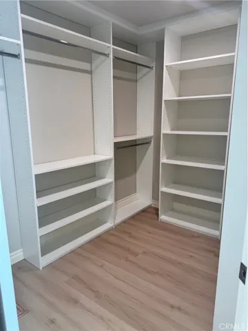 Great walk in closet with lots of shelving. master suite 2