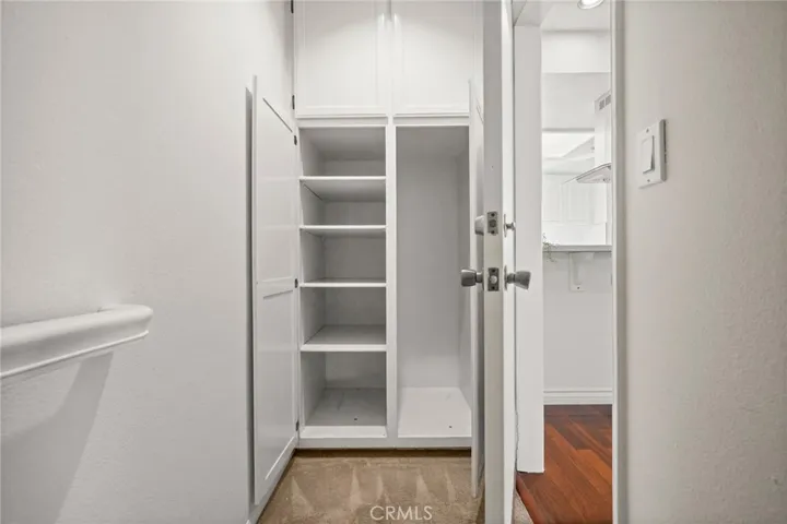 Extra storage in hallway to garage