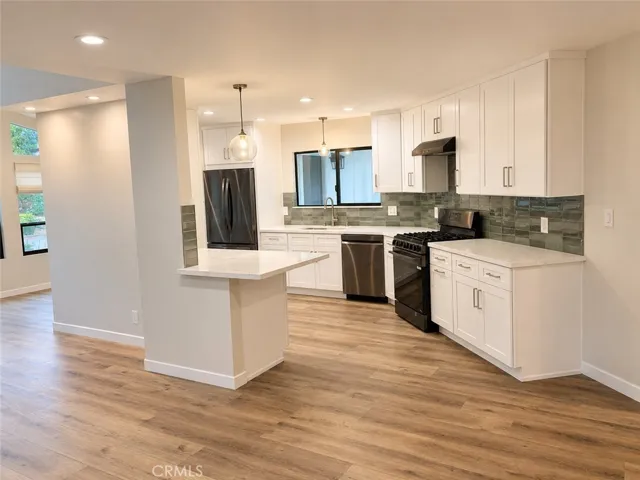 Open kitchen with spacious peninsula