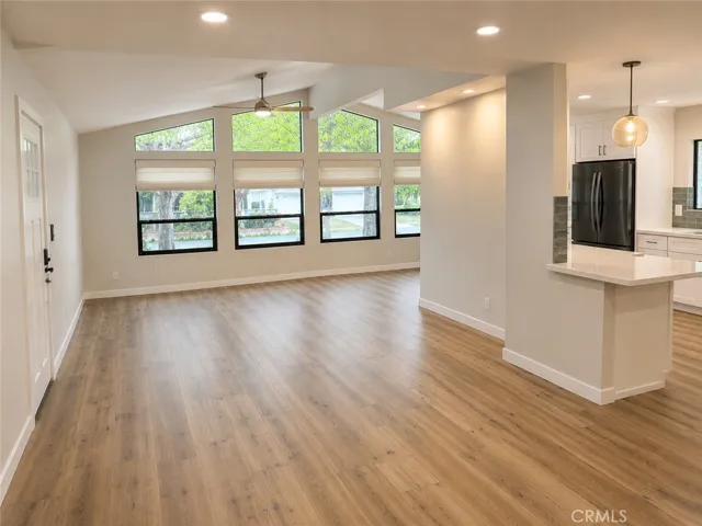 Open-concept living room with vaulted ceilings