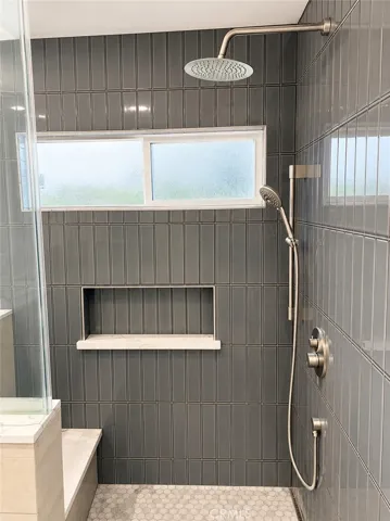 Designer Walk-in shower with custom glass doors