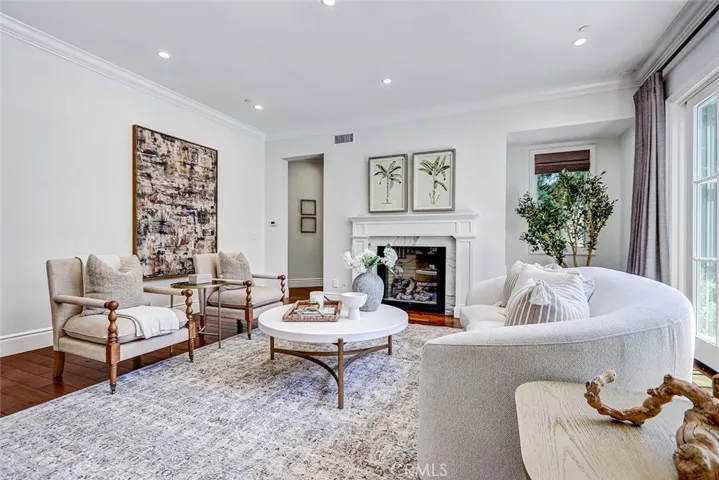 Formal Living Room Area with View to Marble Fireplace