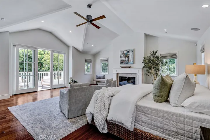 2nd Floor #6 Primary Suite Bedroom with French Doors to Private Deck
