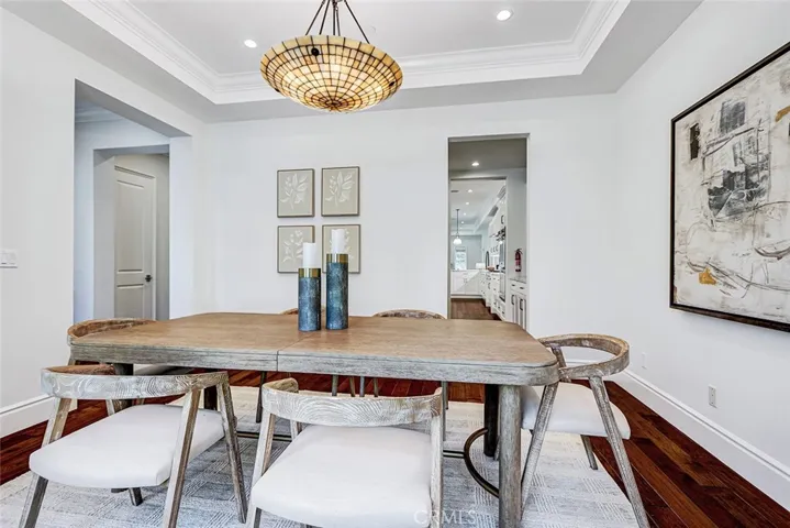 Formal Living Room Area with View to Butler's Pantry and Kitchen