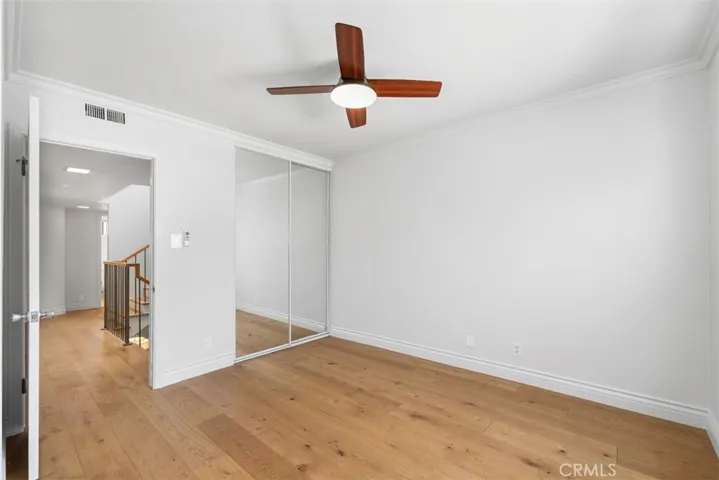 2nd bedroom, with custom ceiling fan.