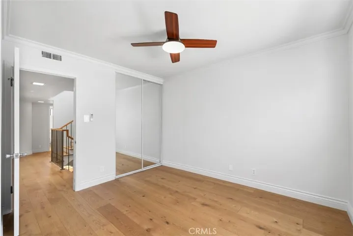 2nd bedroom, with custom ceiling fan.