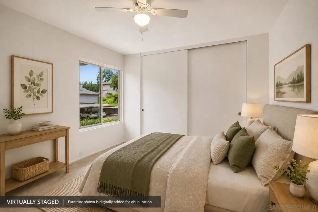 Spacious Primary Bedroom with a wall of closets.