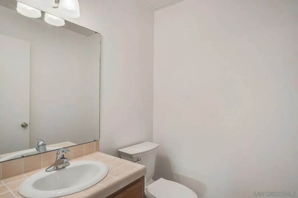 Downstairs Powder Room - potential for conversion to full bathroom.