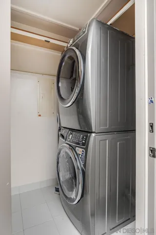 New Washer, Dryer and Bonus Refrigerator in this large utility room.