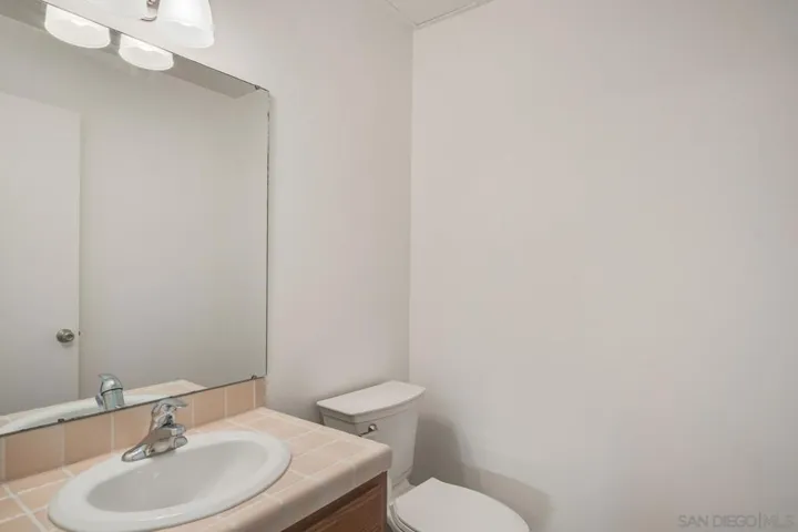 Downstairs Powder Room - potential for conversion to full bathroom.