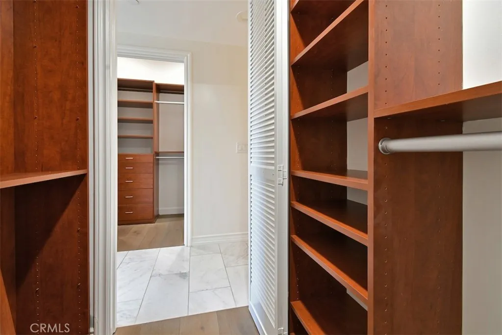 Primary Suite with 2 Walk - In Closets