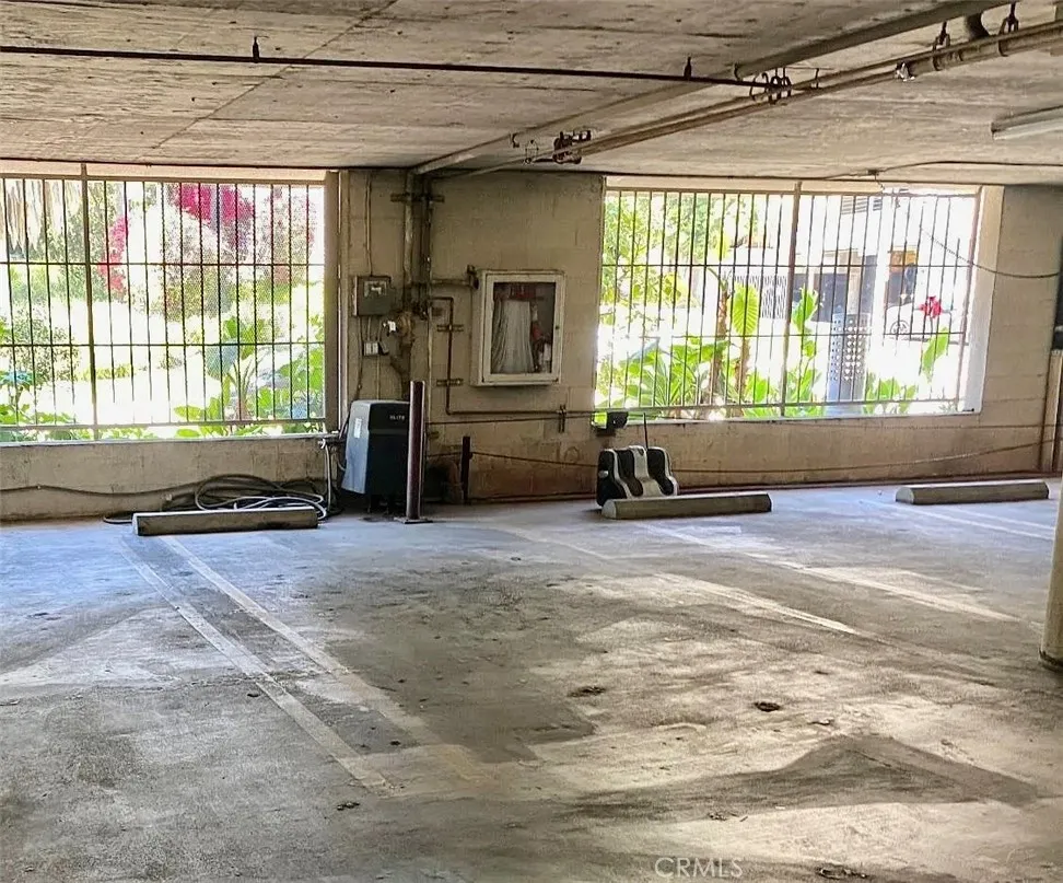 Subterranean Gated garage 2 side by side spaces
