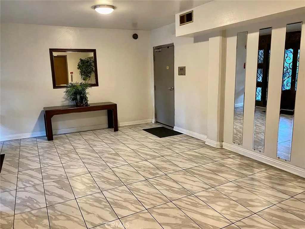 Lobby for mail, from parking and to elevator Lobby for mail, from parking and to elevator