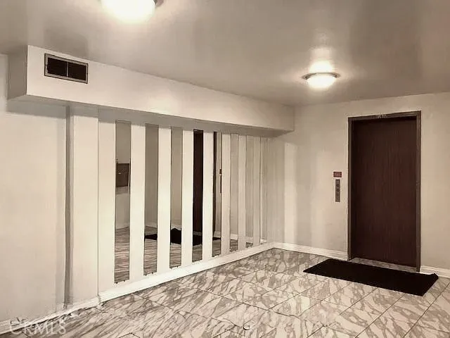 Lobby - ground level elevator to units upstairs