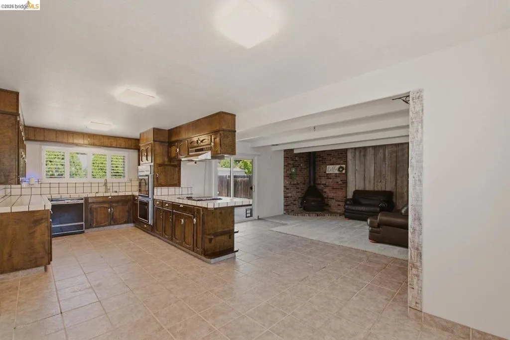 Kitchen, dining nook, and family room