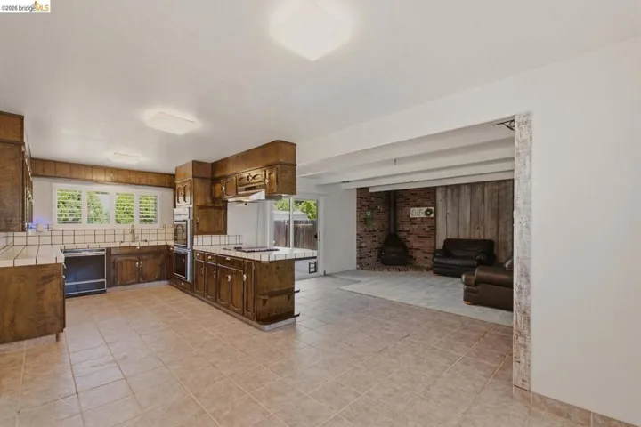 Kitchen, dining nook, and family room