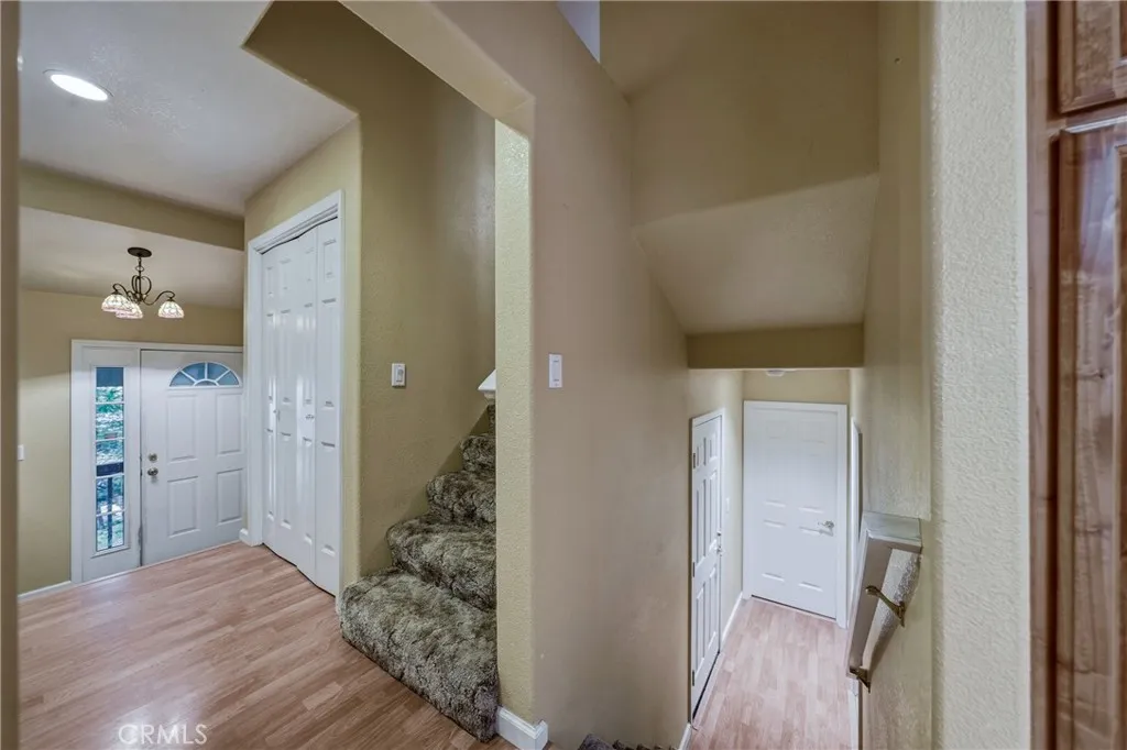 upstairs to 3 bedrooms and 2 baths