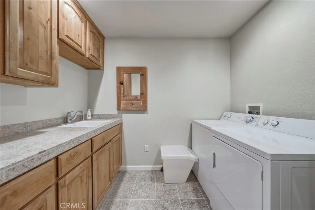 laundry room with sink
