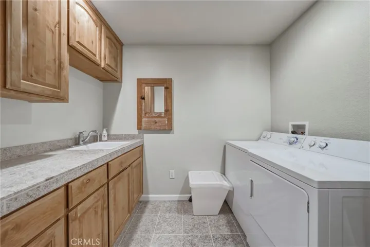 laundry room with sink