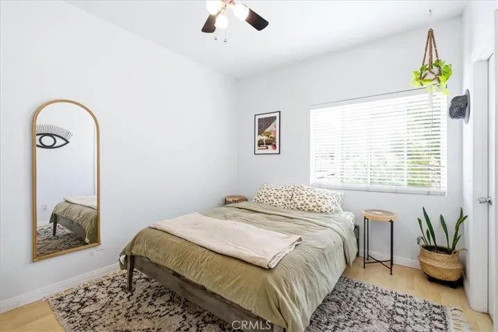 Bedroom with warm natural light and cozy feel