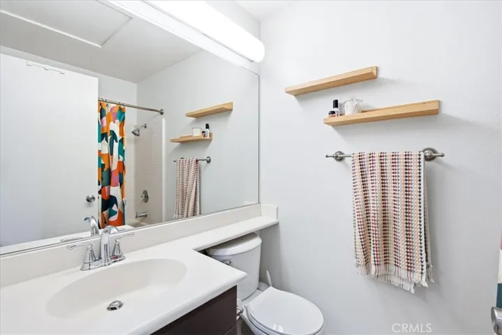 Bathroom with modern fixtures and shower/tub combo