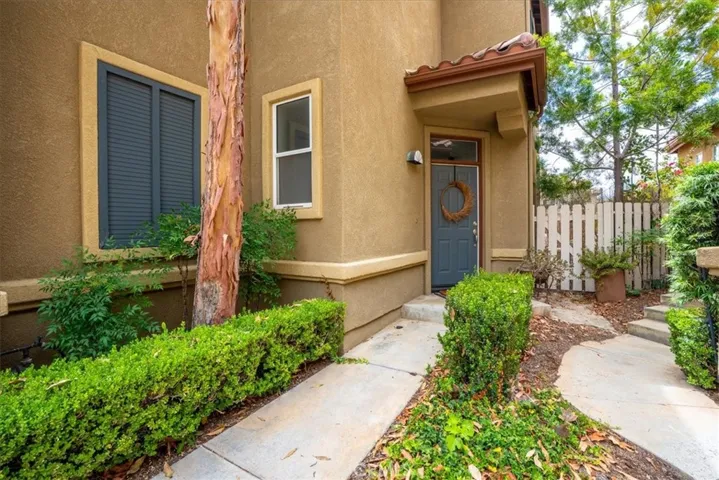Front entry walkway with landscaped curb appeal