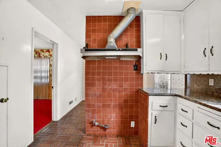 Kitchen with doorway to dining