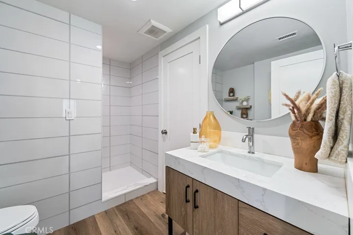 Updated bathroom with dual entry doors