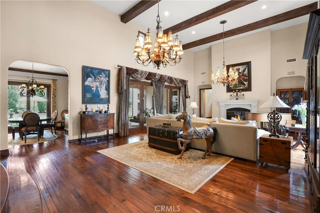 Spacious great room offering seamless indoor-outdoor flow, abundant natural light, and timeless finishes throughout.